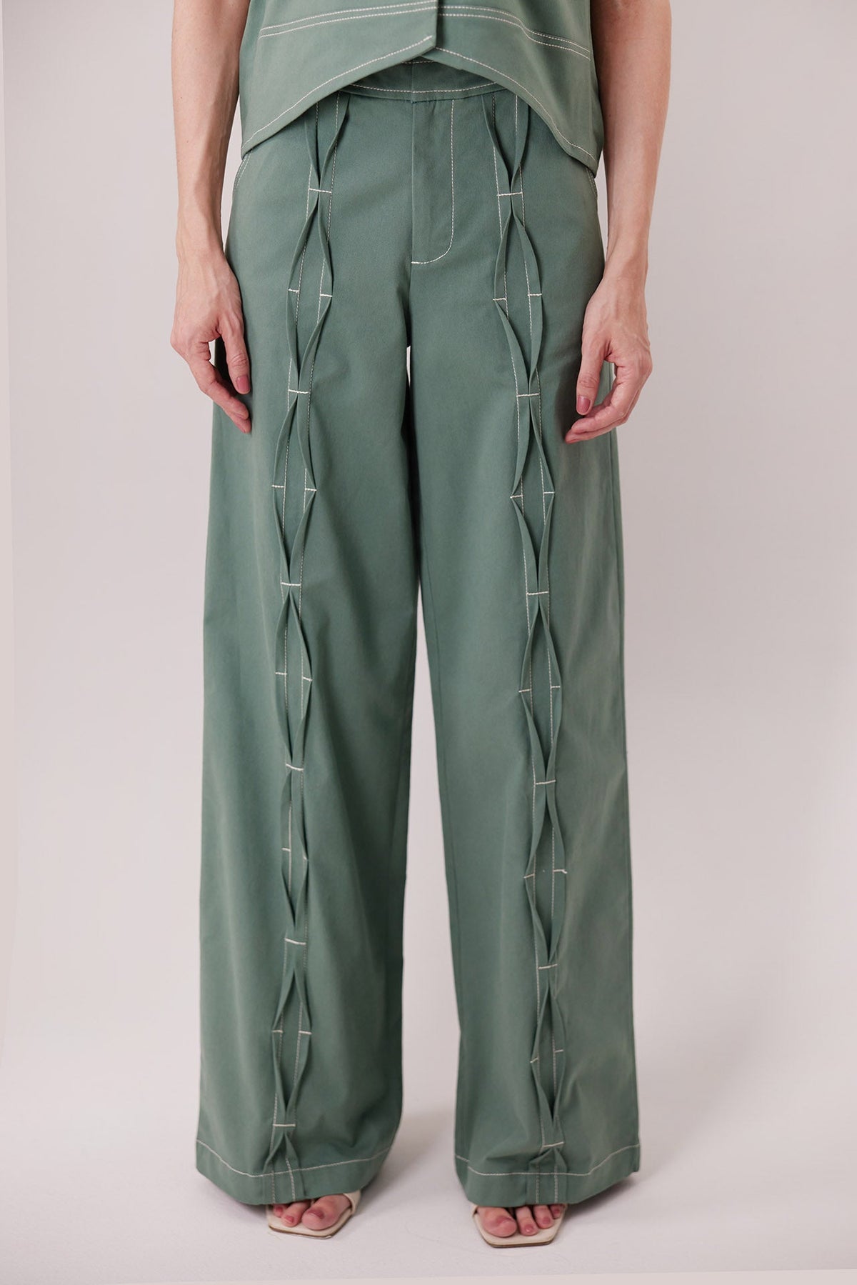 The Bardi Pants, sculptural pleats and topstitching detail — Sanna, The Gentlewoman collection