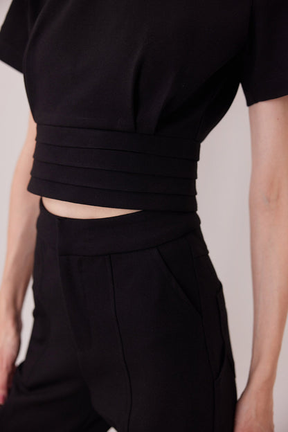 The Elton Pants in black, utility pocket detail — Sanna, The Gentlewoman collection