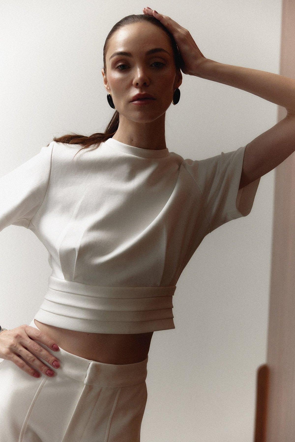 The Polly Top in ivory, waistband detail — Sanna, The Gentlewoman campaign