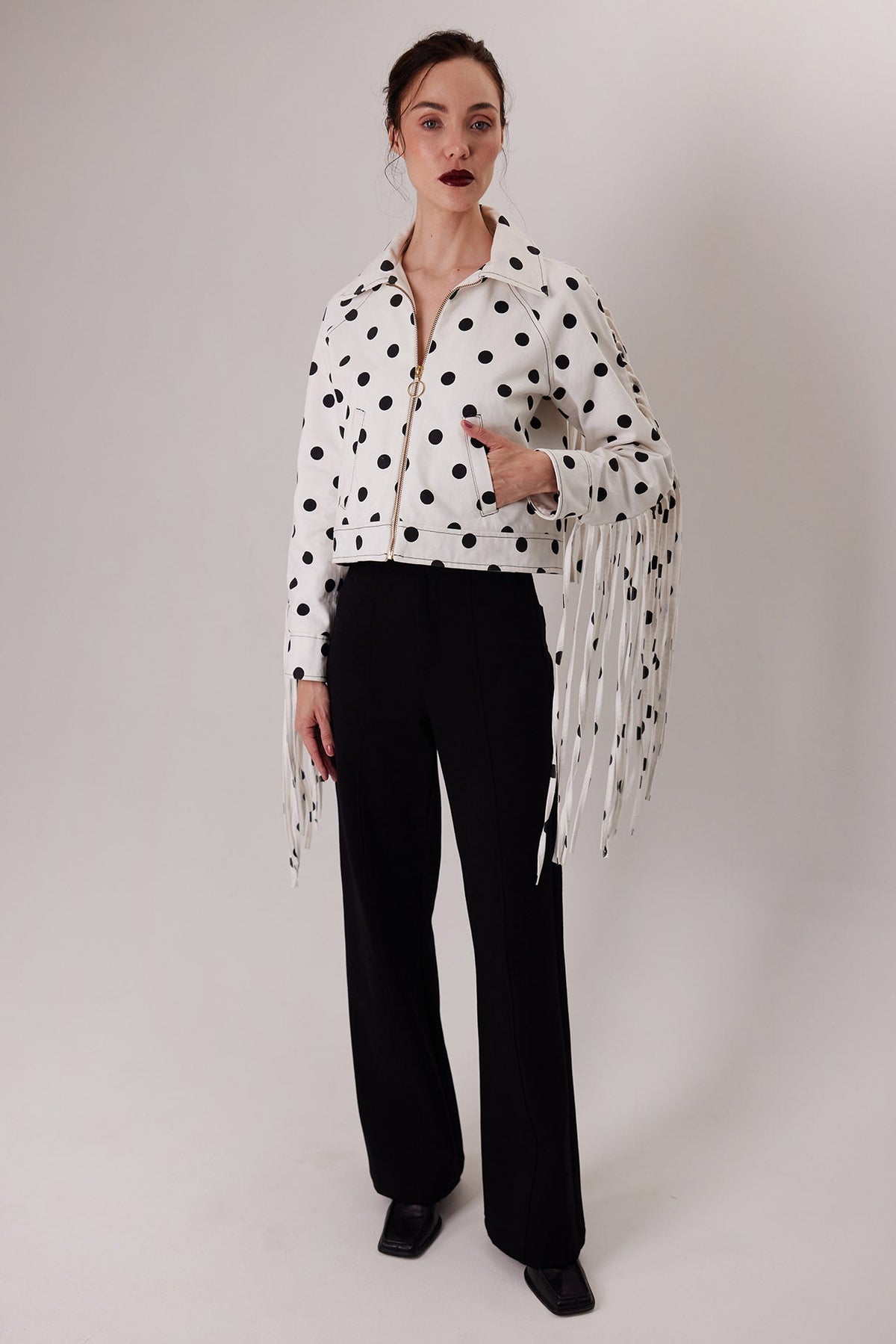The MonteNegro Jacket in polka dots with fringe, with the Elton Pants in black — Sanna, The Gentlewoman collection
