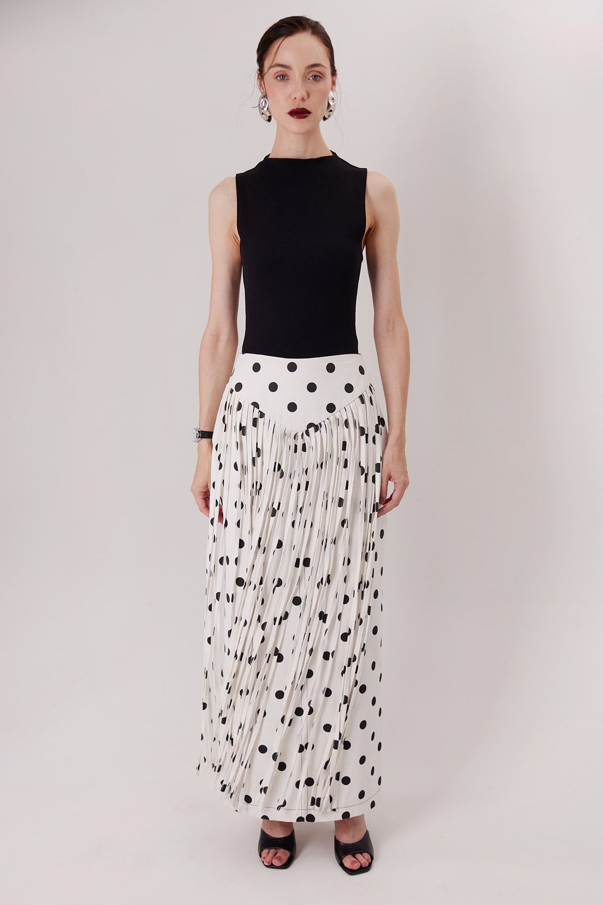 The Consani Top in black with the Ponti Fringe Skirt — Sanna, The Gentlewoman collection