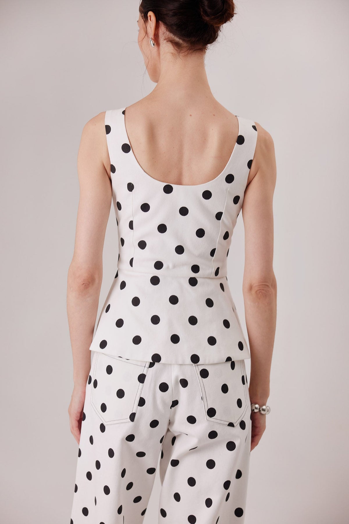 The Esme Ponti Top in polka dots, back view — Sanna, The Gentlewoman collection